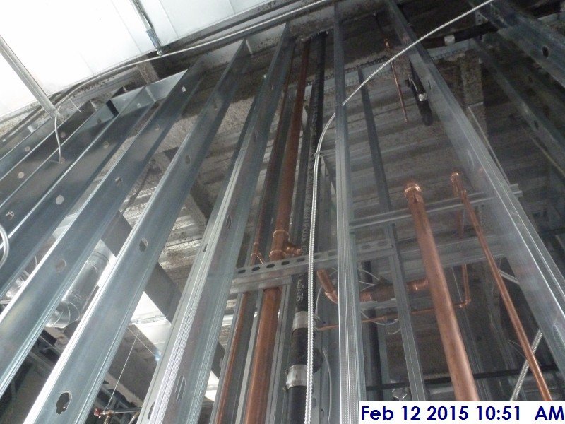 Copper piping going up through the 3rd floor Facing North